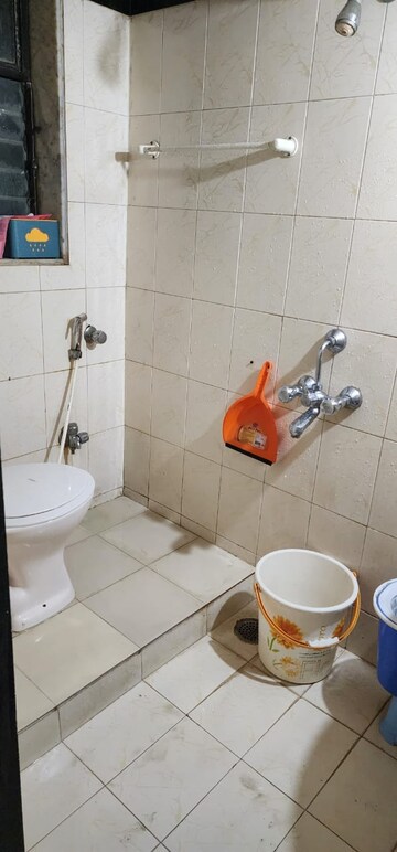 Bathroom in 2 BHK Apartment at Group Seven Rushi Heights, Goregaon East – for Rent
