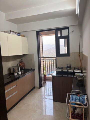 Kitchen in 1 BHK Apartment at MICL Aaradhya Parkwood, Mira Road – for Sale
