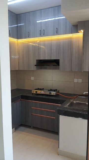 Kitchen in 2 BHK Apartment at Tata Eureka Park, Sector 150 – for Rent