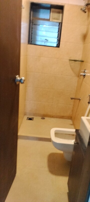 Bathroom in 2 BHK Apartment at Orchid Towers, Andheri West – for Rent