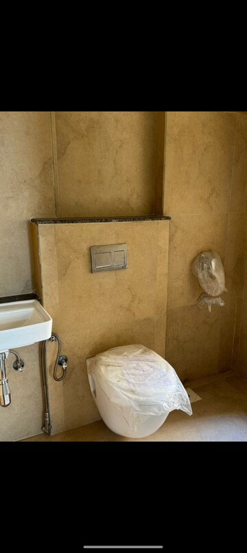 Bathroom in 2 BHK Apartment at Shapoorji Pallonji Siennaa, Kandivali East – for Rent
