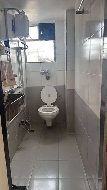 Master Bedroom in 1 BHK Apartment at Om Sai CHS Andheri West, Andheri West – for Rent