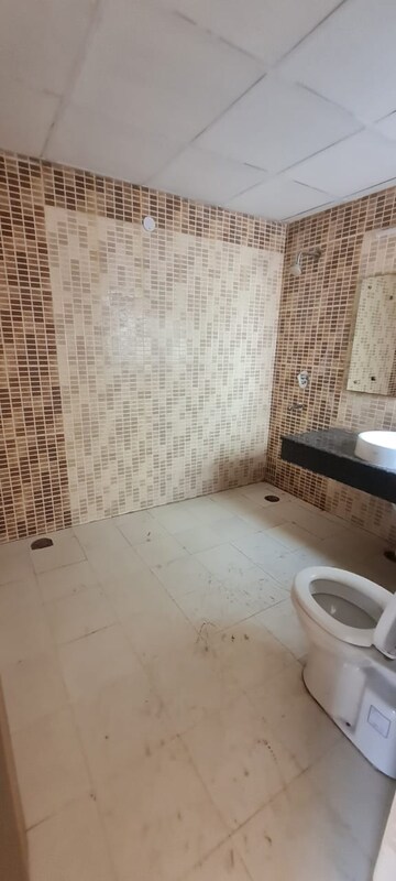 Bathroom in 3 BHK Apartment at Satya The Hermitage, Sector 103 – for Rent