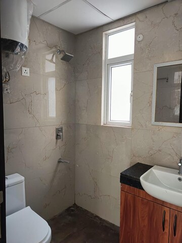 Bathroom in 3.5 BHK Apartment at Smart World Gems, Sector 89 – for Rent