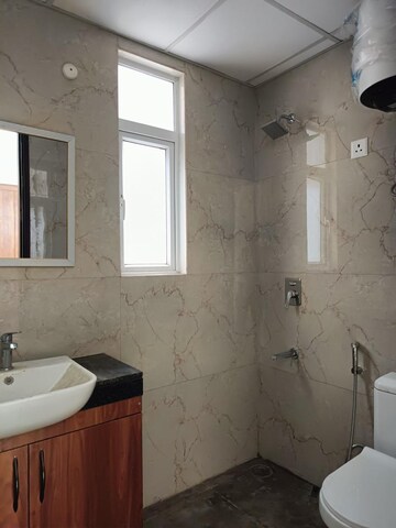 Bathroom in 3.5 BHK Apartment at Smart World Gems, Sector 89 – for Rent