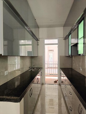Kitchen in 3.5 BHK Apartment at Smart World Gems, Sector 89 – for Rent