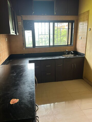 Kitchen in 1 BHK Apartment at Anshul Shree Hans Garden, Dhanori – for Rent