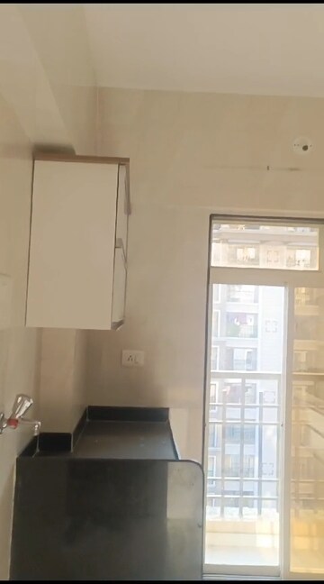 Kitchen in 1 BHK Apartment at Agarwal Paramount, Virar West – for Sale