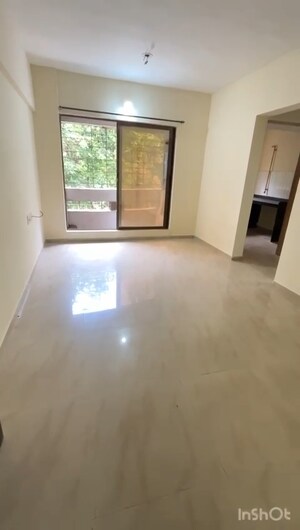 Living Room in 1 BHK Apartment at Rustomjee Global City, Virar West – for Sale