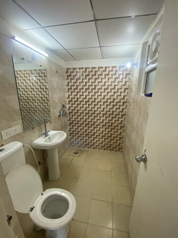Bathroom in 2 BHK Apartment at Gaur Yamuna City 16th Park View, Sector 19 Yamuna Expressway – for Sale