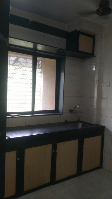 Kitchen in 1 BHK Apartment at Yashwant Residency, Bhandup East – for Rent