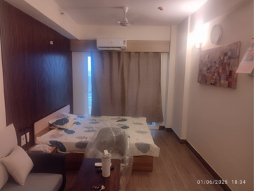 Bedroom in Studio Apartment at Gaur Runway Suites, Gaur Yamuna City – for Rent