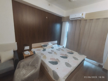 Bedroom in Studio Apartment at Gaur Runway Suites, Gaur Yamuna City – for Rent