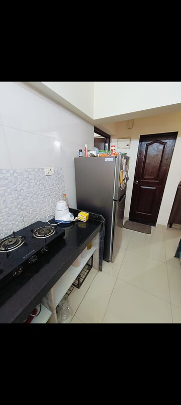 Kitchen in 1 BHK Apartment at Sethia Green View, Goregaon West – for Rent