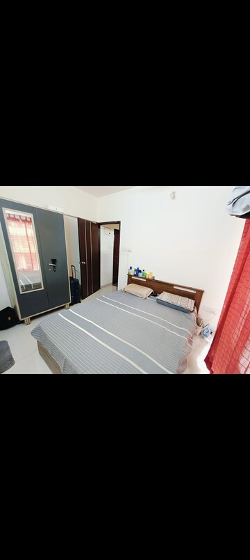 Bedroom in 1 BHK Apartment at Sethia Green View, Goregaon West – for Rent
