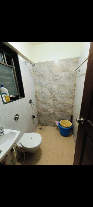 Bathroom in 1 BHK Apartment at Sethia Green View, Goregaon West – for Rent