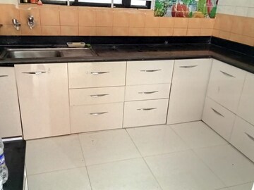 Kitchen in 3 BHK Apartment at Rama Apartment, Walvekar Nagar – for Rent
