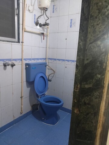 Bathroom in 2 BHK Apartment at Tilak Nagar Building, Tilak Nagar – for Rent