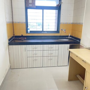 Kitchen in 1 BHK Apartment at Asha Nagar CHS, Asha Nagar – for Sale