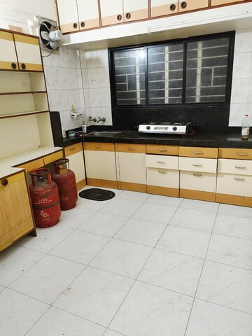 Kitchen in 2 BHK Apartment at Sakal Nagar CHS, Aundh – for Rent