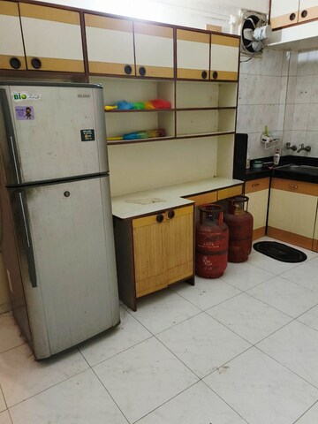 Kitchen in 2 BHK Apartment at Sakal Nagar CHS, Aundh – for Rent