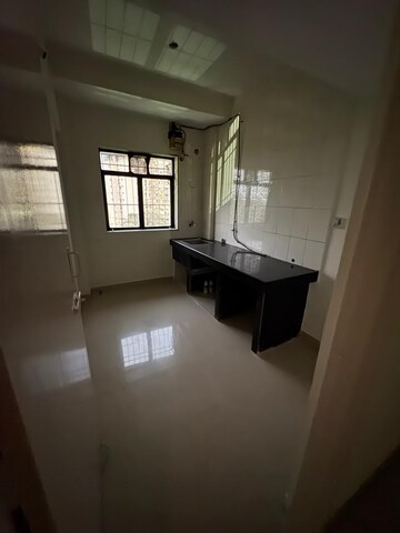 Kitchen in 1 BHK Apartment at Shiv Siddhi Lok Kailash, Mulund West – for Rent