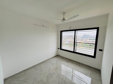 Bedroom in 2 BHK Apartment at Unique Youtopia, Kharadi – for Rent