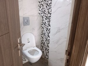 Bathroom in 3 BHK Apartment at Amrapali Crystal Homes, Sector 76 – for Sale