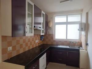 Kitchen in 4 BHK Apartment at Great Value Sharanam, Sector 107 – for Sale