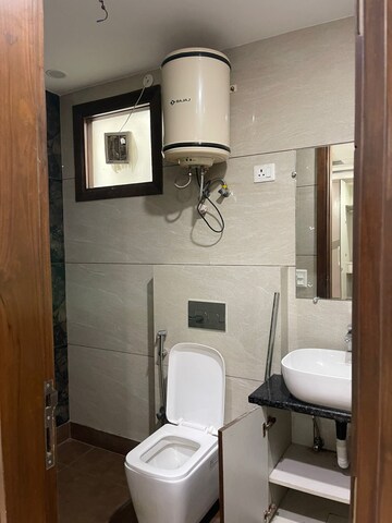 Bathroom in 3 BHK Apartment at Shubh Niketan Apartments, Paschim Vihar – for Rent