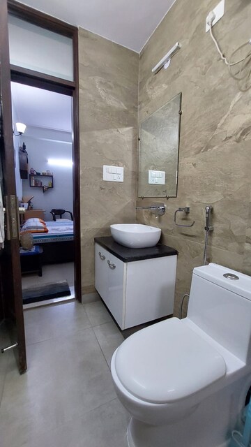Bathroom in 1 BHK Apartment at Jahaz Apartments, Paschim Vihar – for Rent