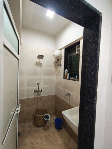 Bathroom in 1 BHK Apartment at Dindoshi Onkar CHS, Malad East – for Rent