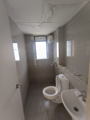 Bathroom in 3 BHK Apartment at Runwal Gardens Phase I, Dombivli East – for Rent