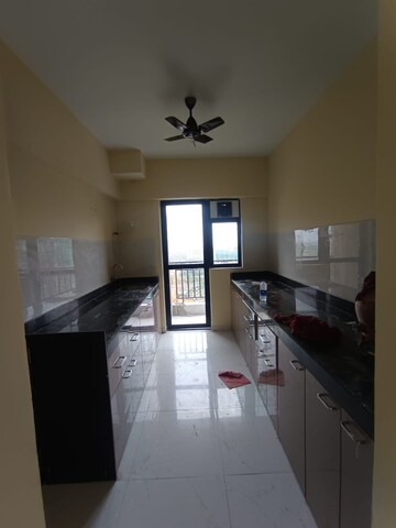 Kitchen in 3 BHK Apartment at Runwal Gardens Phase I, Dombivli East – for Rent