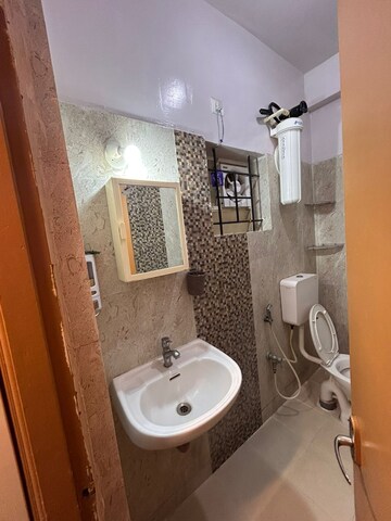 Bathroom in 2 BHK Apartment at Mahaveer Orchids, Hosa Road – for Rent