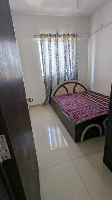 Bedroom in 2 BHK Apartment at Shapoorji Pallonji Joyville Hinjewadi, Hinjewadi – for Rent