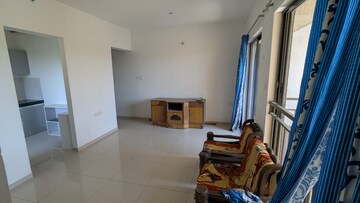 Living Room in 2 BHK Apartment at Shapoorji Pallonji Joyville Hinjewadi, Hinjewadi – for Rent