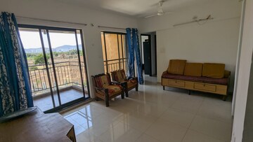 Living Room in 2 BHK Apartment at Shapoorji Pallonji Joyville Hinjewadi, Hinjewadi – for Rent