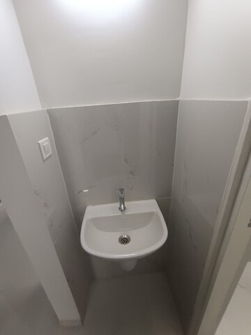 Bathroom in 1 BHK Apartment at Runwal Gardens, Dombivli East – for Rent