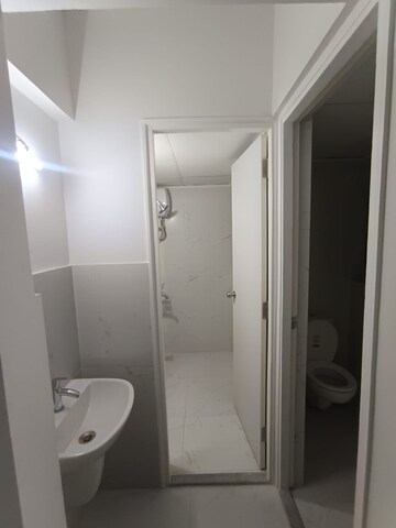 Bathroom in 1 BHK Apartment at Runwal Gardens, Dombivli East – for Rent