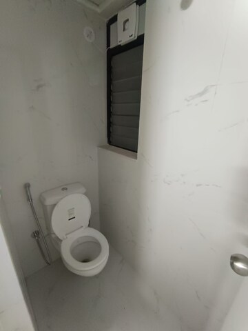 Bathroom in 1 BHK Apartment at Runwal Gardens, Dombivli East – for Rent