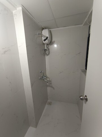 Bathroom in 1 BHK Apartment at Runwal Gardens, Dombivli East – for Rent