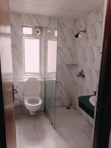Bathroom in 2 BHK Apartment at Nimbus The Golden Palm, Sector 168 – for Rent