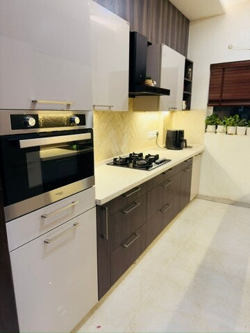 Kitchen in 2.5 BHK Apartment at Vatika Seven Lamps, Sector 82 – for Sale