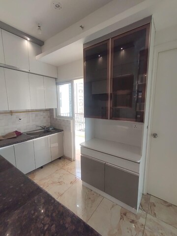 Kitchen in 3 BHK Apartment at Gaur Atulyam, Omicron I Greater Noida – for Sale