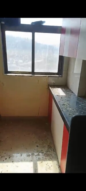 Kitchen in 1 BHK Apartment at KM Horizon Flora, Ghodbunder Road – for Sale