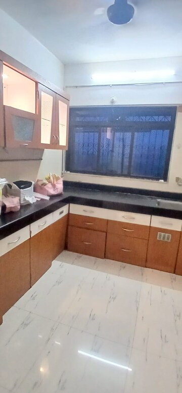 Kitchen in 2 BHK Apartment at Happy Valley, Manpada – for Rent