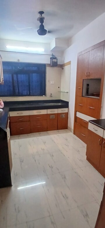 Kitchen in 2 BHK Apartment at Happy Valley, Manpada – for Rent