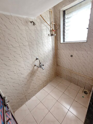 Bathroom in 1 BHK Apartment at Eden Woods complex, Manpada – for Rent