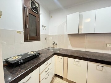 Kitchen in 2 BHK Apartment at Freedom Fighters Enclave – for Rent